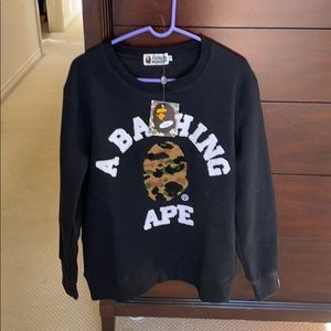 A bathing ape sweatshirt size XL fits like medium